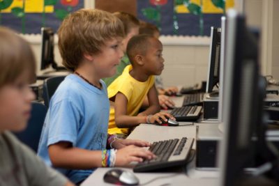 Students programming Learn to code - Why is coding important