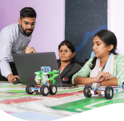 An Image of Teachers Development Program at Arise International where STEMpedia's expert AI Trainer is upskilling the educators with Coding, AI, and Robotics.